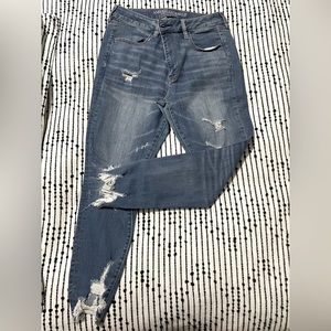High rise A&E destructed denim skinny jeans in US Size 12.